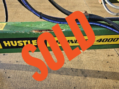 Used Hustler Chainless 4000 Bale Feeder | FarmShop NZ - Used Farm Implement